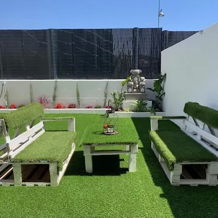 Bajo Con Jardin En Primera Linea De Playa Malaga